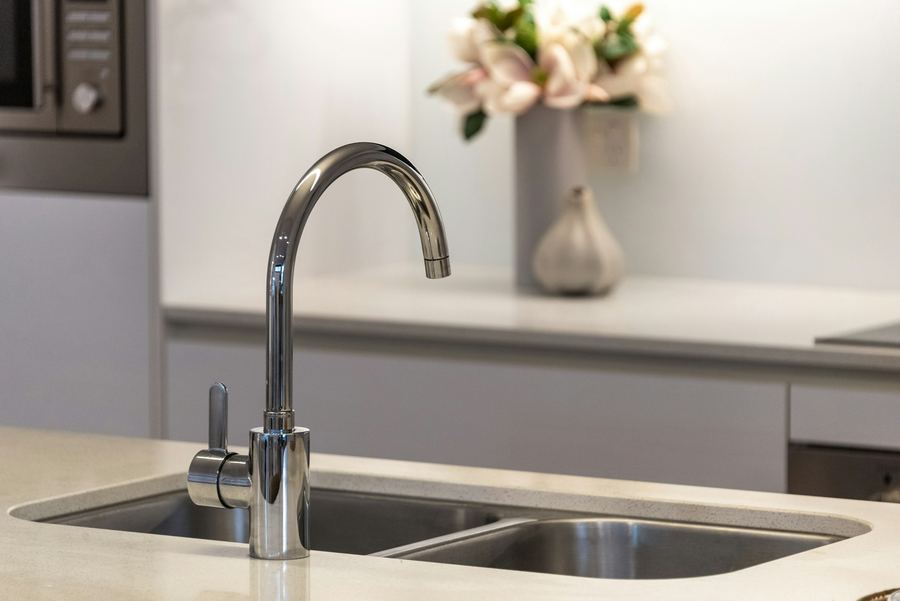 New stainless kitchen faucet over a double sink